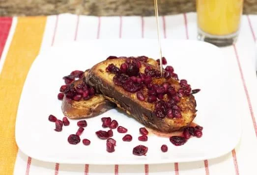 French Toast with Pomegranate Cranberry Compote and Clementine Syrup
